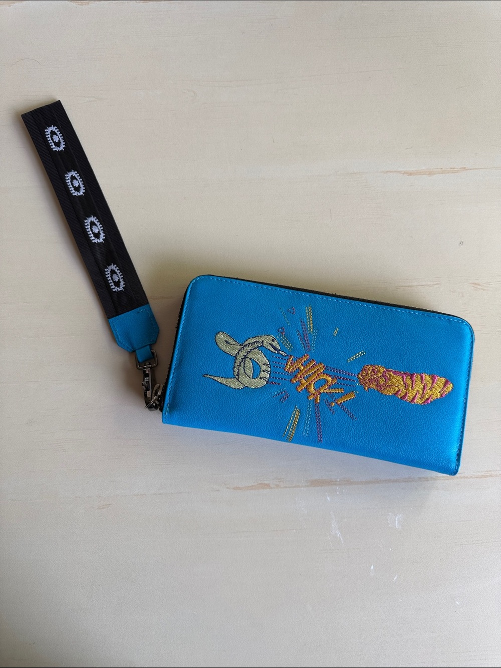 Min & Mon fun comic style bright blue wristlet